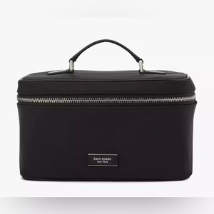 Kate Spade.                                Sam Icon KSNYL
Vanity Case